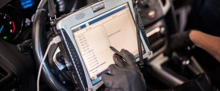 mechanic diagnosing vibration during acceleration