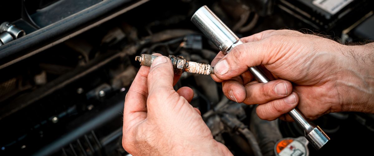 worn spark plugs causing low rpm vibration